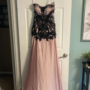 Brand new pink gown embellished with black lace and beading and sequins.